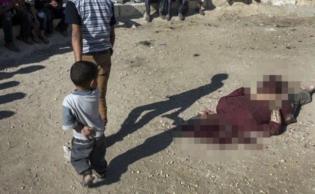 File:Syria-Assad-Fighters-Beheaded-Aug-2013-02.jpg